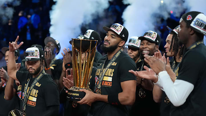 Dec 16, 2025; Las Vegas, Nevada, USA; New York Knicks center Karl-Anthony Towns (32) and teammates react after winning the Emirates NBA Cup Final at T-Mobile Arena. Mandatory Credit: Kirby Lee-Imagn Images Dec 16, 2025; Las Vegas, Nevada, USA; New York Knicks center Karl-Anthony Towns (32) and teammates react after winning the Emirates NBA Cup Final at T-Mobile Arena. Mandatory Credit: Kirby Lee-Imagn Images