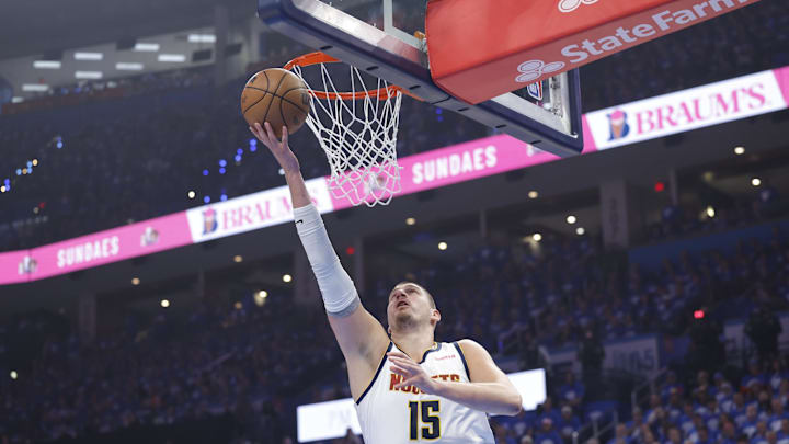 May 18, 2025; Oklahoma City, Oklahoma, USA; Denver Nuggets center Nikola Jokic (15) goes to the basket against the Oklahoma City Thunder in the first quarter during game seven of the second round for the 2025 NBA Playoffs at Paycom Center. Mandatory Credit: Alonzo Adams-Imagn Images
