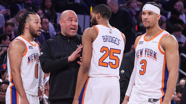Feb 8, 2025; New York, New York, USA; New York Knicks assistant coach Rick Brunson talks with New York Knicks guard Jalen Brunson (11), forward Mikal Bridges (25), and guard Josh Hart (3) during a timeout in the third quarter against the Boston Celtics at Madison Square Garden. Mandatory Credit: Wendell Cruz-Imagn Images Feb 8, 2025; New York, New York, USA; New York Knicks assistant coach Rick Brunson talks with New York Knicks guard Jalen Brunson (11), forward Mikal Bridges (25), and guard Josh Hart (3) during a timeout in the third quarter against the Boston Celtics at Madison Square Garden. Mandatory Credit: Wendell Cruz-Imagn Images