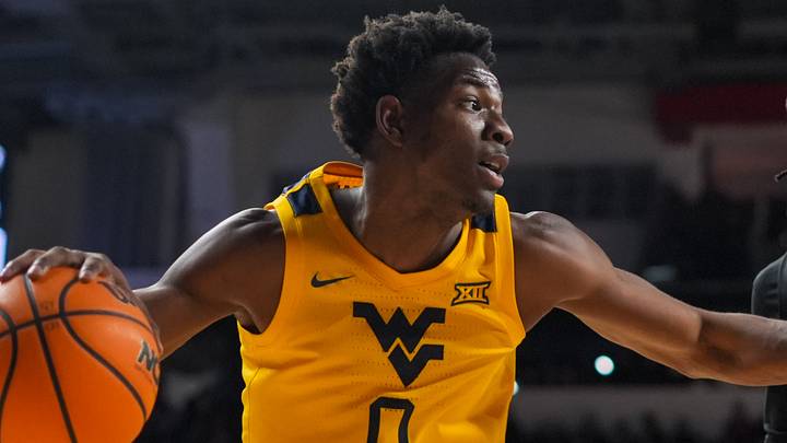 Feb 5, 2026; Cincinnati, Ohio, USA; West Virginia Mountaineers forward Brenen Lorient (0) dribbles the ball against Cincinnati Bearcats guard Day Day Thomas (1) in the second half at Fifth Third Arena. Mandatory Credit: Aaron Doster-Imagn Images Feb 5, 2026; Cincinnati, Ohio, USA; West Virginia Mountaineers forward Brenen Lorient (0) dribbles the ball against Cincinnati Bearcats guard Day Day Thomas (1) in the second half at Fifth Third Arena. Mandatory Credit: Aaron Doster-Imagn Images