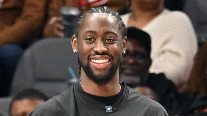 Caris LeVert #3 of the Atlanta Hawks looks on from the sideline during a game against the Orlando Magic.