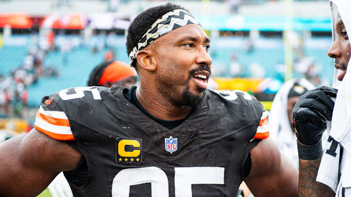 Sep 15, 2024; Jacksonville, Florida, USA; Cleveland Browns defensive end Myles Garrett (95) talks with Jacksonville Jaguars defensive end Josh Hines-Allen (41) after a game at EverBank Stadium. Mandatory Credit: Jeremy Reper-Imagn Images