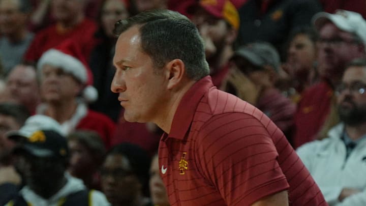Iowa State Cyclones men's basketball head coach T.J. Otzelberger watches from bench against Iowa during the first half in the men’s basketball Cy-Hawk series on Dec. 11, 2025, in Ames, Iowa. 