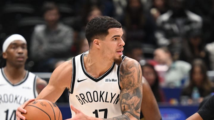 Nov 16, 2025; Washington, District of Columbia, USA;  Brooklyn Nets forward Michael Porter Jr. (17) looks to pass the ball infant to Washington Wizards guard Bilal Coulibaly (0) during the third quarter at Capital One Arena. Mandatory Credit: Rafael Suanes-Imagn Images