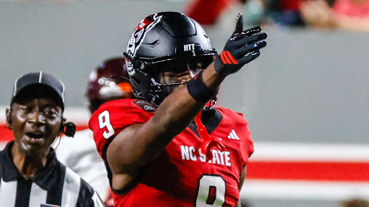 Sep 27, 2025; Raleigh, North Carolina, USA; North Carolina State Wolfpack wide receiver Terrell Anderson (9) celebrates a down during the first half of the game against Virginia Tech Hokies at Carter-Finley Stadium. Mandatory Credit: Jaylynn Nash-Imagn Images Sep 27, 2025; Raleigh, North Carolina, USA; North Carolina State Wolfpack wide receiver Terrell Anderson (9) celebrates a down during the first half of the game against Virginia Tech Hokies at Carter-Finley Stadium. Mandatory Credit: Jaylynn Nash-Imagn Images