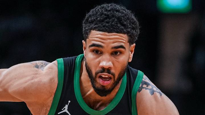 Apr 28, 2026; Boston, Massachusetts, USA; Boston Celtics forward Jayson Tatum (0) drives the ball against Philadelphia 76ers guard Tyrese Maxey (0) in the second half during game five of the first round of the 2026 NBA Playoffs at TD Garden. Mandatory Credit: David Butler II-Imagn Images