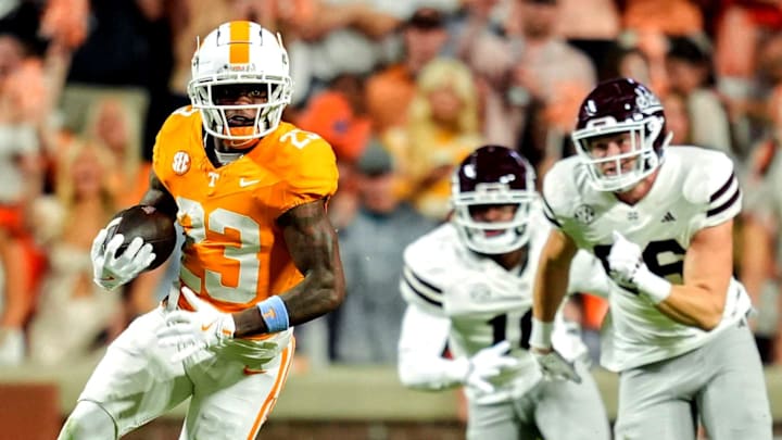 Tennessee's Boo Carter runs with the ball against Mississippi State during a 2024 game at Neyland Stadium. The SEC plays eight conference game. The Big Ten plays nine and would like the SEC to reduce its number of cupcake games, but might that backfire on the Big Ten?
