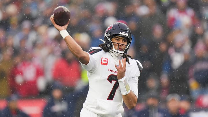 Jan 18, 2026; Foxborough, MA, USA; Houston Texans quarterback C.J. Stroud (7) throws in the first quarter against the New England Patriots in an AFC Divisional Round game at Gillette Stadium. Mandatory Credit: Brian Fluharty-Imagn Images