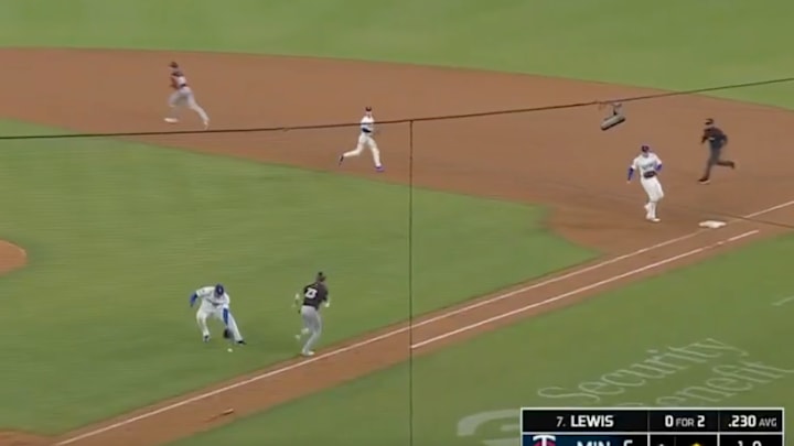 Edgardo Henriquez's bad throw went all the way to the right field wall and plated three runs. 