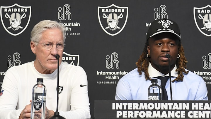 Apr 25, 2025; Henderson, NV, USA; (L-R) Las Vegas Raiders head coach Pete Carroll, Ashton Jeanty and general manager John Spytek during a news conference introducing Jeanty as the first round draft pick in the 2025 NFL Draft at Intermountain Health Performance Center. Mandatory Credit: Candice Ward-Imagn Images