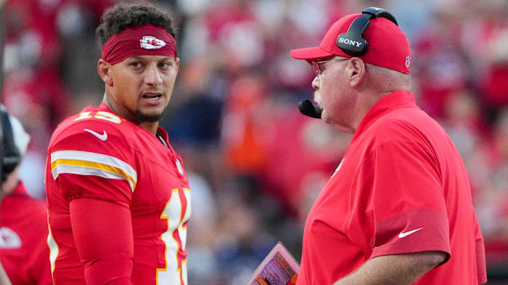 Aug 22, 2025; Kansas City, Missouri, USA; Kansas City Chiefs quarterback Patrick Mahomes (15) talks with head coach Andy Reid after a play against the Chicago Bears during the first half of the game at GEHA Field at Arrowhead Stadium. Mandatory Credit: Denny Medley-Imagn Images