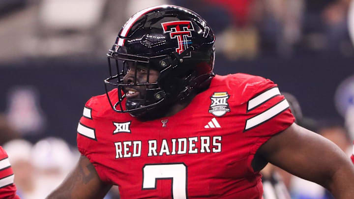 Texas Tech's Lee Hunter runs to the sideline after making a tackle against BYU during the Big 12 Conference championship football game, Saturday, Nov. 6, 2025, at AT&T Stadium in Arlington. Texas Tech's Lee Hunter runs to the sideline after making a tackle against BYU during the Big 12 Conference championship football game, Saturday, Nov. 6, 2025, at AT&T Stadium in Arlington.