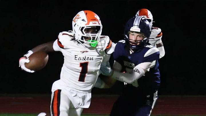 NCAA Division I prospect Ja'Zir Dickerson blows past Kent Island defenders en route to a touchdown in last week's 49-7 victory. NCAA Division I prospect Ja'Zir Dickerson blows past Kent Island defenders en route to a touchdown in last week's 49-7 victory.
