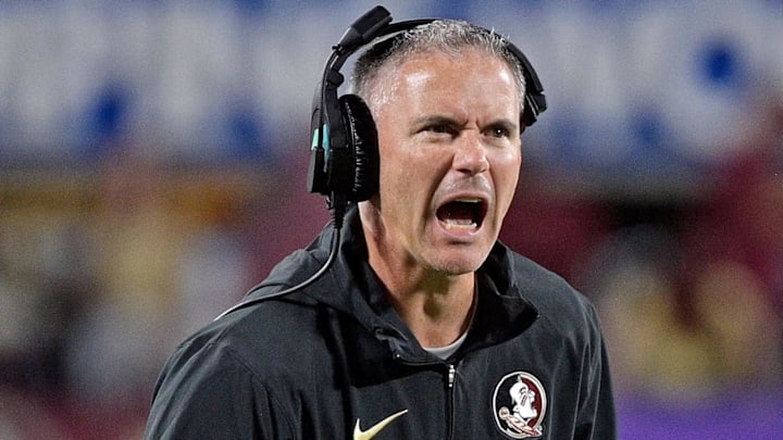 Sep 3, 2023; Orlando, Florida, USA; Florida State Seminoles head coach Mike Norvell is excited during the fourth quarter against the Louisiana State Tigers at Camping World Stadium. Mandatory Credit: Melina Myers-Imagn Images