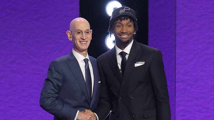 Jun 23, 2026; New York, NY, USA; NBA commissioner Adam Silver greets the second pick in the 2026 NBA draft, Kansas guard Darryn Peterson after he was selected by the Utah Jazz at Barclays Center. Mandatory Credit: Brad Penner-Imagn Images