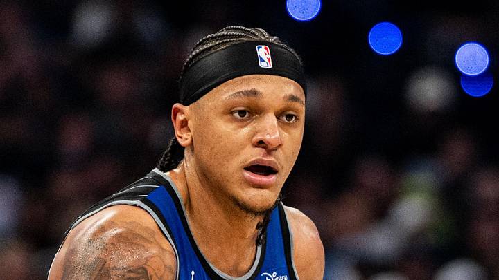 May 1, 2026; Orlando, Florida, USA; Orlando Magic forward Paolo Banchero (5) dribbles the ball against Detroit Pistons forward Duncan Robinson (55) in the fourth quarter during game six of the first round of the 2026 NBA Playoffs at Kia Center. Mandatory Credit: Jeremy Reper-Imagn Images
