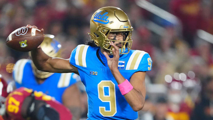 Nov 29, 2025; Los Angeles, California, USA; UCLA Bruins quarterback Nico Iamaleava (9) throws the ball against the Southern California Trojans in the first half at United Airlines Field at Los Angeles Memorial Coliseum. Mandatory Credit: Kirby Lee-Imagn Images
