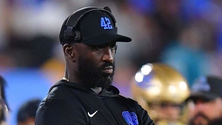 Aug 30, 2025; Pasadena, California, USA; UCLA Bruins head coach DeShaun Foster watches game action against the Utah Utes during the second half at Rose Bowl. Mandatory Credit: Gary A. Vasquez-Imagn Images