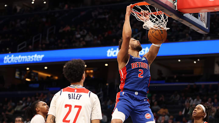 Mar 17, 2026; Washington, District of Columbia, USA; Detroit Pistons guard Cade Cunningham (2) dunks over Washington Wizards guard Will Riley (27) and guard Tre Johnson (12) during the first half at Capital One Arena. Mandatory Credit: Daniel Kucin Jr.-Imagn Images Mar 17, 2026; Washington, District of Columbia, USA; Detroit Pistons guard Cade Cunningham (2) dunks over Washington Wizards guard Will Riley (27) and guard Tre Johnson (12) during the first half at Capital One Arena. Mandatory Credit: Daniel Kucin Jr.-Imagn Images