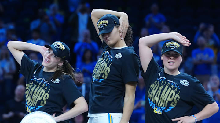 UCLA Bruins forward Gabriela Jaquez (11) and center Lauren Betts (51) and guard Charlisse Leger-Walker (5)