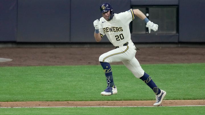 Milwaukee Brewers left fielder Brandon Lockridge (20) hits a single during the third inning of their game against the Tampa Bay Rays Monday, March 30, 2026 American Family Field in Milwaukee, Wisconsin.