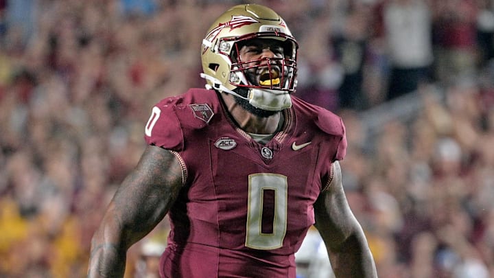 Oct 21, 2023; Tallahassee, Florida, USA; Florida State Seminoles defensive lineman Fabien Lovett (0) celebrates a defensive stop against the Duke Blue Devils in the second half at Doak S. Campbell Stadium. Mandatory Credit: Melina Myers-Imagn Images