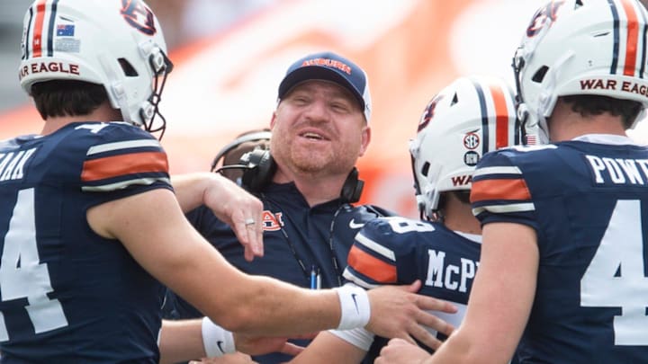 Auburn Tigers kicker Alex McPherson (38) celebrates his 55-yard field goal with head coach Alex Golesh during Auburn Tigers A-Day spring game at Jordan-Hare Stadium in Auburn, Ala. on Saturday, April 18, 2026.