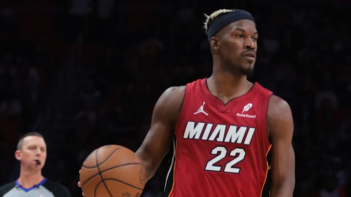 Jan 21, 2025; Miami, Florida, USA; Miami Heat forward Jimmy Butler (22) dribbles the basketball against the Portland Trail Blazers during the second quarter at Kaseya Center. Mandatory Credit: Sam Navarro-Imagn Images