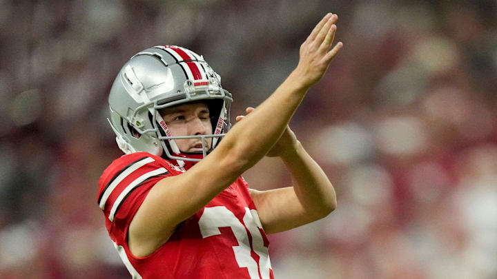 Ohio State Buckeyes kicker Jayden Fielding (38) lines up his kick Saturday, Dec. 6, 2025, during the Big Ten football championship against the Indiana Hoosiers at Lucas Oil Stadium in Indianapolis. Ohio State Buckeyes kicker Jayden Fielding (38) lines up his kick Saturday, Dec. 6, 2025, during the Big Ten football championship against the Indiana Hoosiers at Lucas Oil Stadium in Indianapolis.