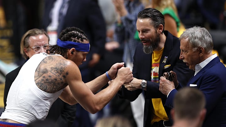 Jun 1, 2023; Denver, CO, USA; Denver Nuggets forward Aaron Gordon (left) fist bumps owner Stan Kroenke and vice chairman Josh Kroenke before the game against the Miami Heat in game one of the 2023 NBA Finals at Ball Arena. Mandatory Credit: Isaiah J. Downing-Imagn Images