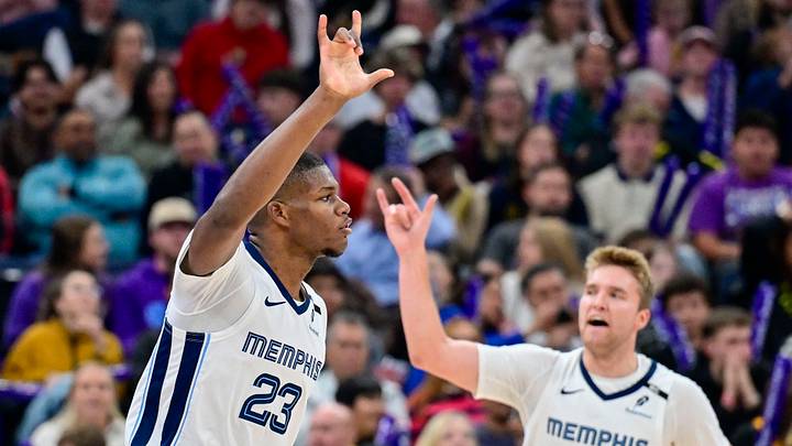 Oct 26, 2026; Salt Lake City, Utah, USA;  Memphis Grizzlies guard Cedric Coward (23) and guard Cam Spencer (24) celebrate a three-point shot during the second half against the Utah Jazz at Delta Center.  Mandatory Credit: Peter Creveling-Imagn Images