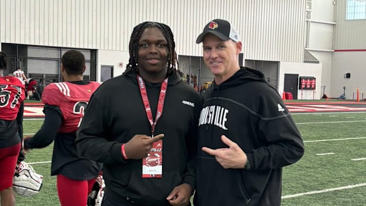 Radcliff (Ky.) North Hardin defensive tackle and Louisville defensive line coach Mark Hagen Radcliff (Ky.) North Hardin defensive tackle and Louisville defensive line coach Mark Hagen