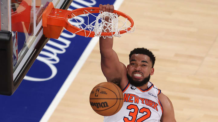 May 29, 2025; New York, New York, USA; New York Knicks center Karl-Anthony Towns (32) dunks against Indiana Pacers forward Jarace Walker (5) in the fourth quarter during game five of the eastern conference finals for the 2025 NBA Playoffs at Madison Square Garden. Mandatory Credit: Brad Penner-Imagn Images