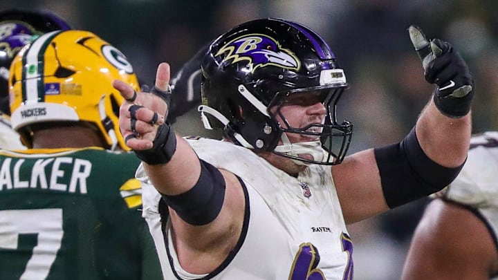 Baltimore Ravens center Tyler Linderbaum (64) reacts after a defensive penalty against the Green Bay Packers.