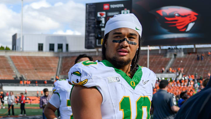 Sep 14, 2024; Corvallis, Oregon, USA; Oregon Ducks offensive lineman Iapani Laloulu (72) and Oregon Ducks defensive end Matayo Uiagalelei (10) leave the field after the game against the Oregon State Beavers at Reser Stadium. Mandatory Credit: Craig Strobeck-Imagn Images