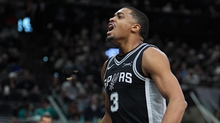 Dec 31, 2025; San Antonio, Texas, USA; San Antonio Spurs forward Keldon Johnson (3) celebrates in the first half against the New York Knicks in the first half fat Frost Bank Center.