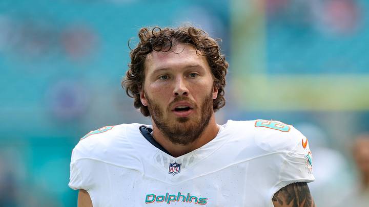 Sep 14, 2025; Miami Gardens, Florida, USA; Miami Dolphins guard Cole Strange (69) looks on before a game against the New England Patriots at Hard Rock Stadium. Mandatory Credit: Nathan Ray Seebeck-Imagn Images