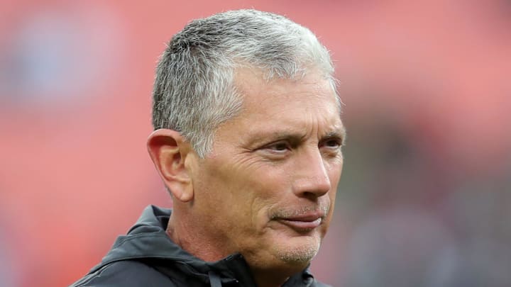 Cleveland Browns defensive coordinator Jim Schwartz watches the team warm up before a game against the Baltimore Ravens on Nov. 16, 2025, in Cleveland.
