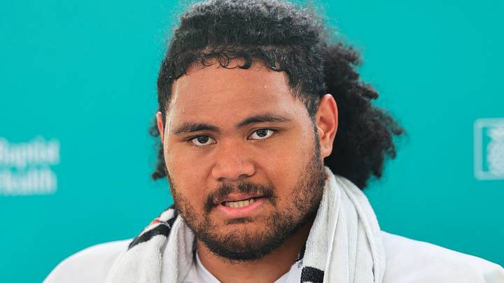 Miami Dolphins guard Jonah Savaiinaea