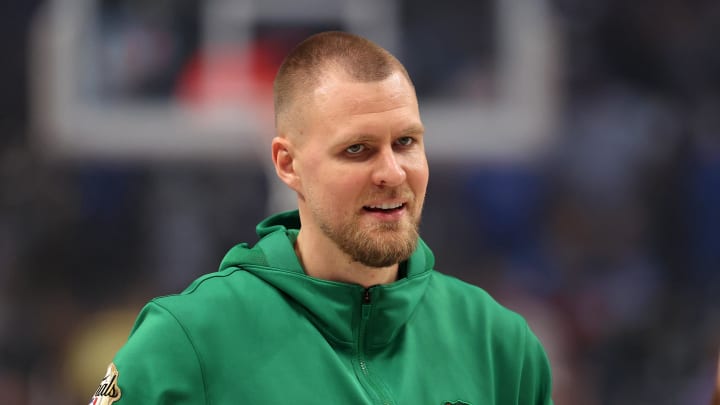 Jun 14, 2024; Dallas, Texas, USA; Boston Celtics center Kristaps Porzingis (8) looks on before game four of the 2024 NBA Finals against the Dallas Mavericks at American Airlines Center. Mandatory Credit: Peter Casey-USA TODAY Sports Jun 14, 2024; Dallas, Texas, USA; Boston Celtics center Kristaps Porzingis (8) looks on before game four of the 2024 NBA Finals against the Dallas Mavericks at American Airlines Center. Mandatory Credit: Peter Casey-USA TODAY Sports