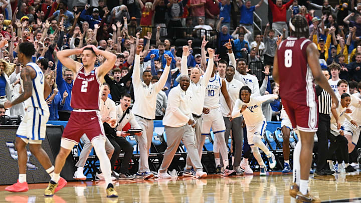 Mar 20, 2026; St. Louis, MO, USA; Santa Clara Broncos guard Sash Gavalyugov (2) and the Kentucky Wildcats bench react to the game-tying shot by guard Otega Oweh (00) as time expires in the second half of a first round game of the men's 2026 NCAA Tournament at Enterprise Center. Mandatory Credit: Jeff Le-Imagn Images Mar 20, 2026; St. Louis, MO, USA; Santa Clara Broncos guard Sash Gavalyugov (2) and the Kentucky Wildcats bench react to the game-tying shot by guard Otega Oweh (00) as time expires in the second half of a first round game of the men's 2026 NCAA Tournament at Enterprise Center. Mandatory Credit: Jeff Le-Imagn Images