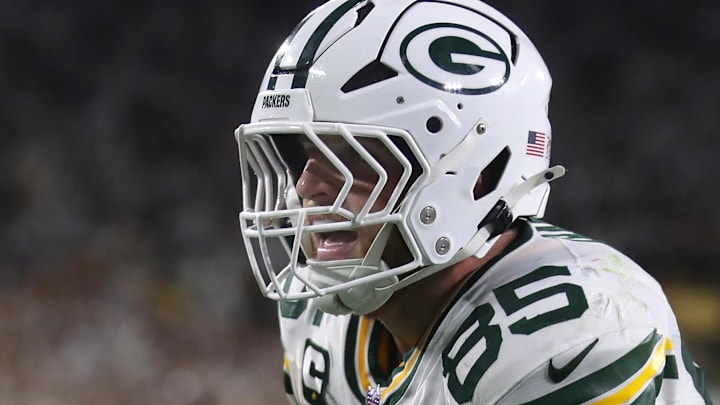 Green Bay Packers tight end Tucker Kraft (85) scores a touchdown against the Washington Commanders at Lambeau Field. 
