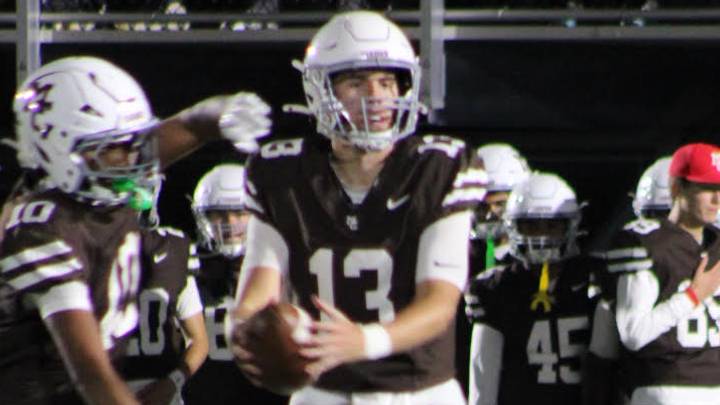 Mount Carmel quarterback Brady Cloherty (13) transferred to the Caravan this year with no guarantee of being the team's starting quarterback. On Friday he threw seven touchdown passes for the second time this season. Mount Carmel quarterback Brady Cloherty (13) transferred to the Caravan this year with no guarantee of being the team's starting quarterback. On Friday he threw seven touchdown passes for the second time this season.