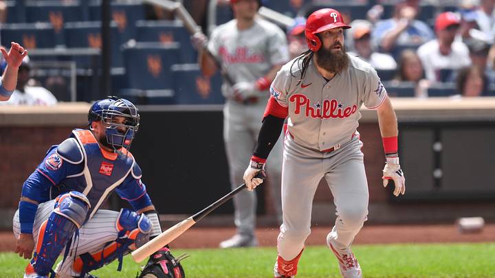 Jun 28, 2026; New York City, New York, USA; Philadelphia Phillies left fielder Brandon Marsh (16) hits a RBI single against the New York Mets during the third inning at Citi Field. 