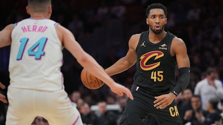 Jan 29, 2025; Miami, Florida, USA; Cleveland Cavaliers guard Donovan Mitchell (45) brings the ball up the court against the Miami Heat during the first half at Kaseya Center. Mandatory Credit: Jim Rassol-Imagn Images Jan 29, 2025; Miami, Florida, USA; Cleveland Cavaliers guard Donovan Mitchell (45) brings the ball up the court against the Miami Heat during the first half at Kaseya Center. Mandatory Credit: Jim Rassol-Imagn Images