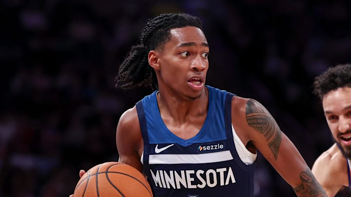 Oct 13, 2024; New York, New York, USA; Minnesota Timberwolves guard Rob Dillingham (4) dribbles up court in front of New York Knicks guard Landry Shamet (44) during the second half at Madison Square Garden. Mandatory Credit: Vincent Carchietta-Imagn Images