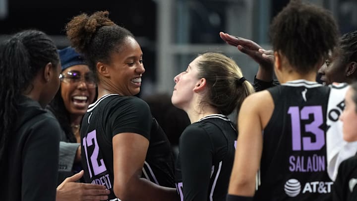 Aug 31, 2025; San Francisco, California, USA; Golden State Valkyries center Iliana Rupert (12) is congratulated by guard Kate Martin (center right) after making a three point basket against the Indiana Fever during the fourth quarter at Chase Center. Mandatory Credit: Darren Yamashita-Imagn Images