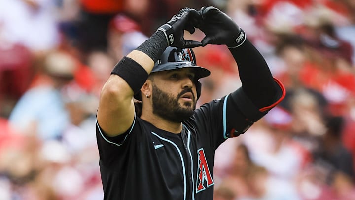 Jun 7, 2025; Cincinnati, Ohio, USA; Arizona Diamondbacks third baseman Eugenio Suarez (28) reacts after hitting a solo home run in the second inning against the Cincinnati Reds at Great American Ball Park. Mandatory Credit: Katie Stratman-Imagn Images