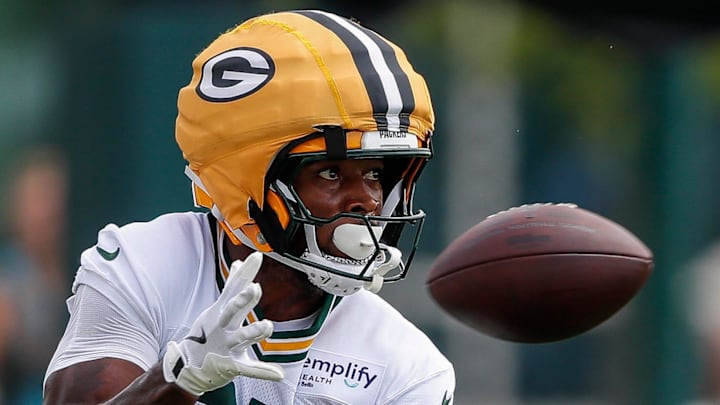 Green Bay Packers wide receiver Romeo Doubs (87) catches a pass at training camp.