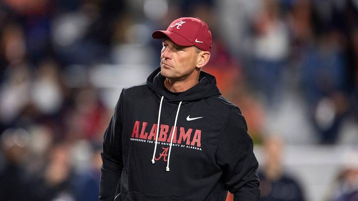 Alabama Crimson Tide head coach Kalen DeBoer watches on during warm ups before Auburn Tigers take on Alabama Crimson Tide. Alabama Crimson Tide head coach Kalen DeBoer watches on during warm ups before Auburn Tigers take on Alabama Crimson Tide.